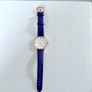 Woman’s Kate Spade ♠️ blue and gold watch
